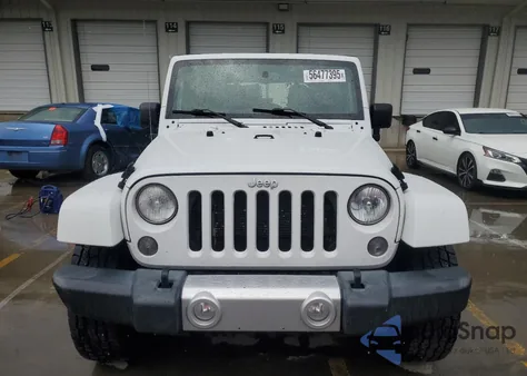 2015 Jeep Wrangler Unlimited Sahara z USA, uszkodzony, nr VIN 1C4HJWEGXFL722947